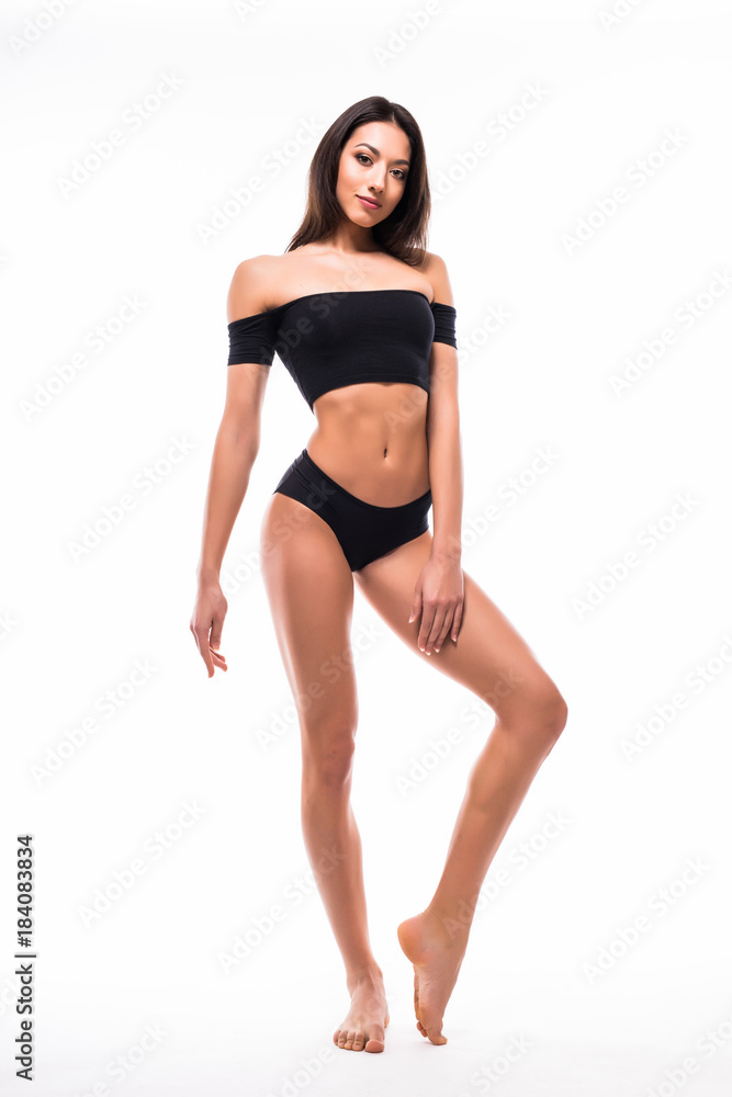 Beautiful Woman with perfect sport body in black underwear isolated on white backgroun. Perfect Body. Full length portrait Beautiful Woman with perfect sport body in black underwear isolated on white backgroun. Perfect Body. Full length portrait