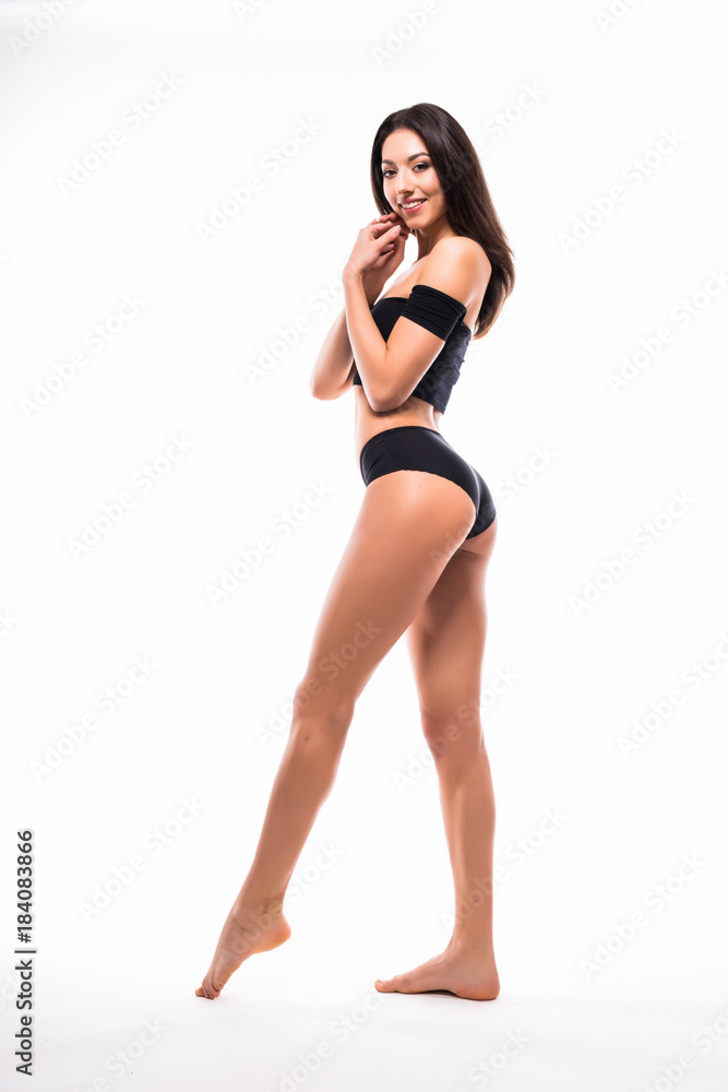 Beautiful Woman with perfect sport body in black underwear isolated on white backgroun. Perfect Body. Full length portrait Beautiful Woman with perfect sport body in black underwear isolated on white backgroun. Perfect Body. Full length portrait