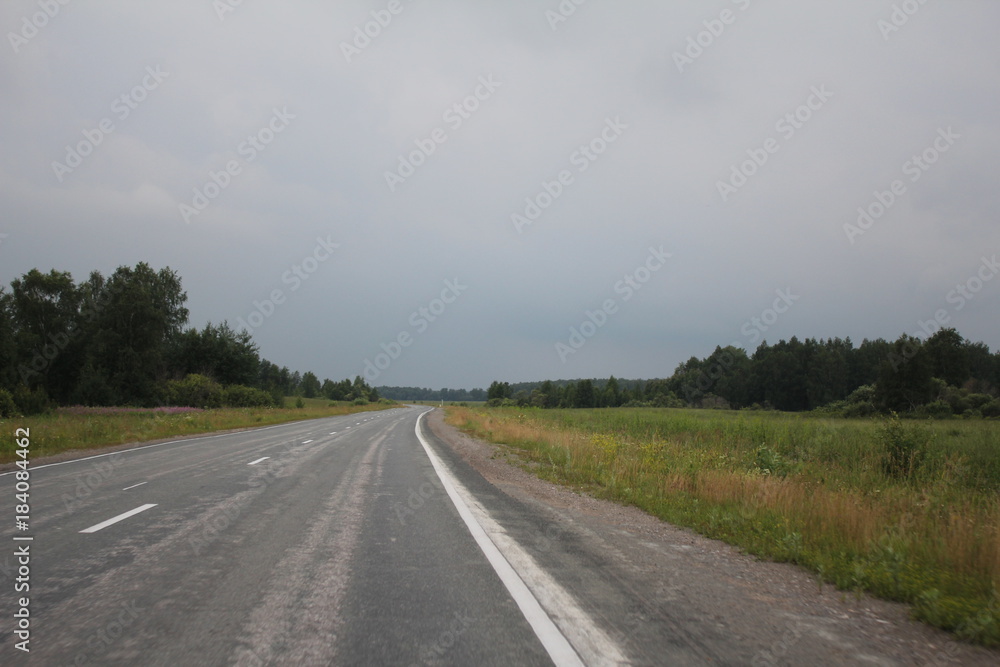  traveling by motorbike: the road goes into the distance