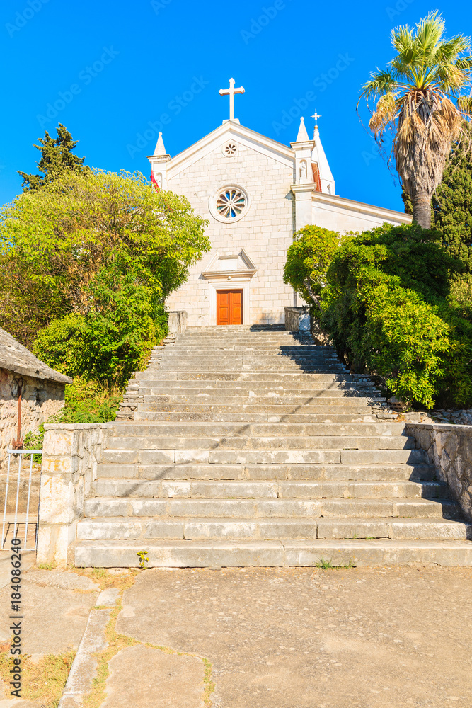 Steps to beautiful church in Rogoznica old town, Dalmatia, Croatia