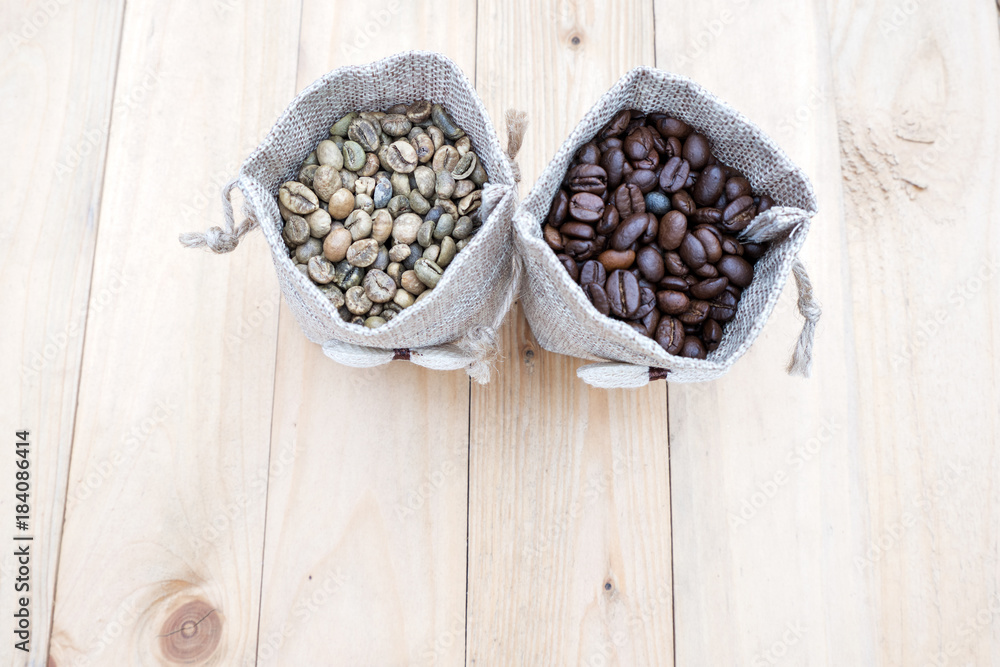 Bag of coffee beans and a cup of coffee on the table. Bag of coffee beans and a cup of coffee on the table.