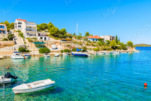 Boats anchoring in beautiful bay with turquoise sea water in Razanj port, Dalmatia, Croatia