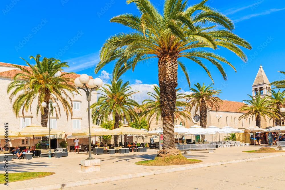 TROGIR TOWN, CROATIA - SEP 6, 2017: historical buildings and church in old town of Trogir on sunny summer day, Dalmatia, Croatia.