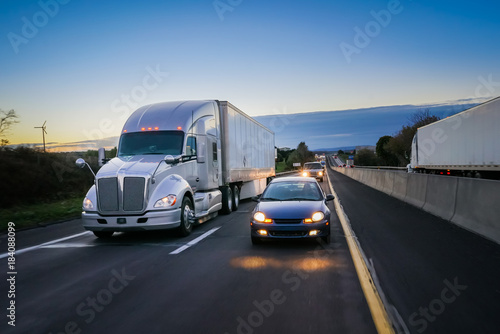 semi truck 18 wheeler on highway evening © 5m3photos