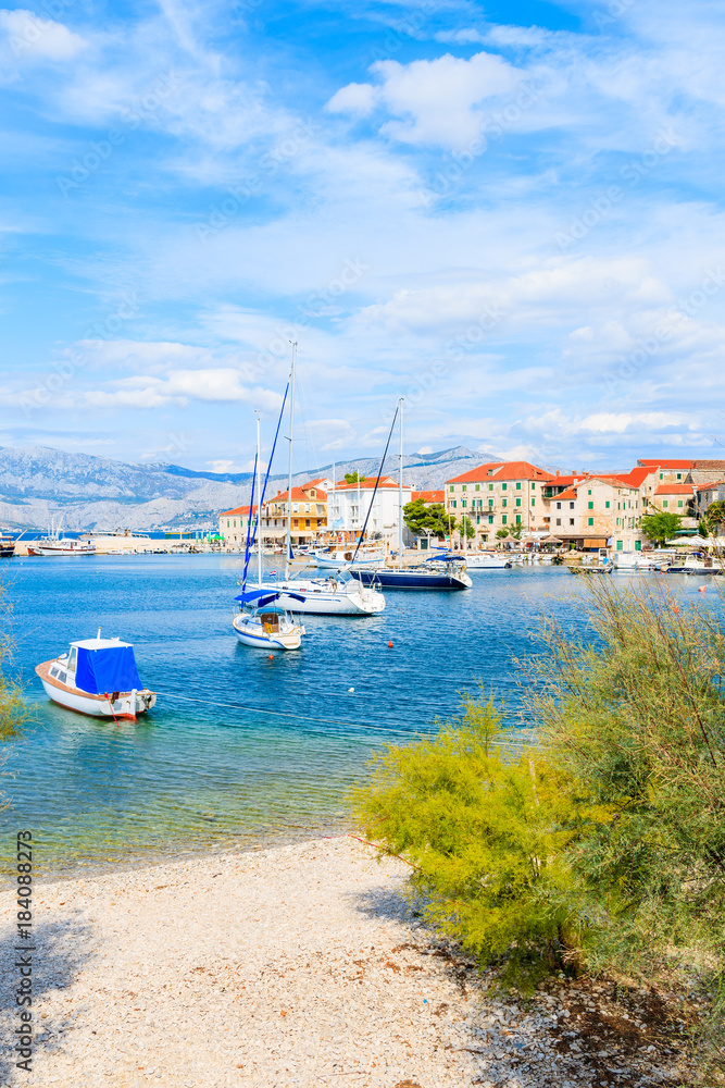 View of beautiful beach in Postira port, Brac island, Croatia
