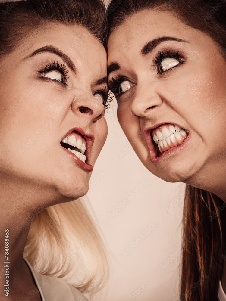 Two agressive women having argue fight Two agressive women having argue fight