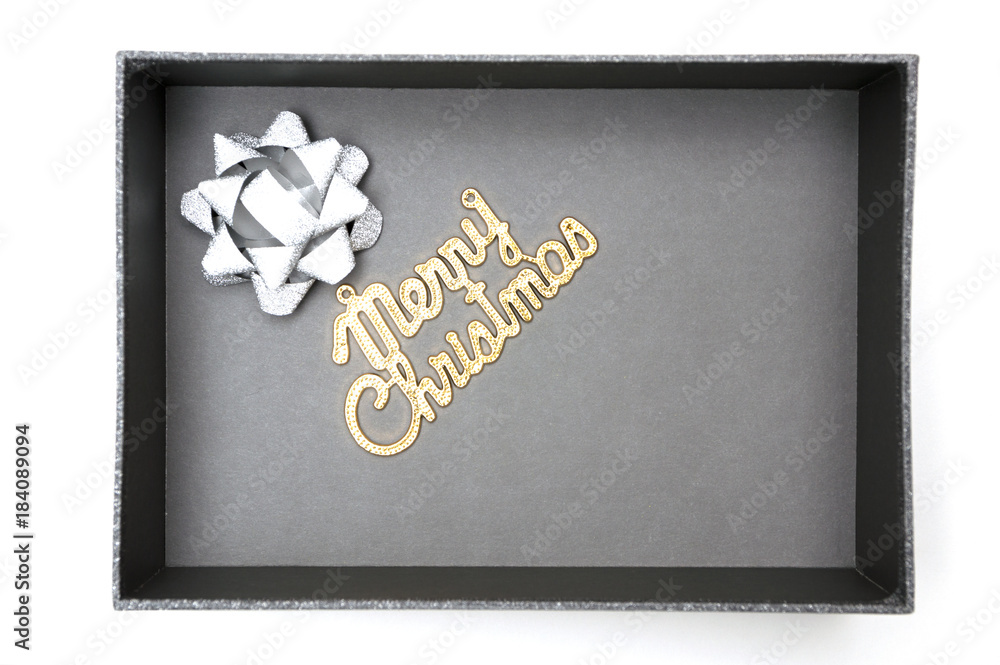 Merry christmas text and ribbon in black gift box Merry christmas text and ribbon in black gift box