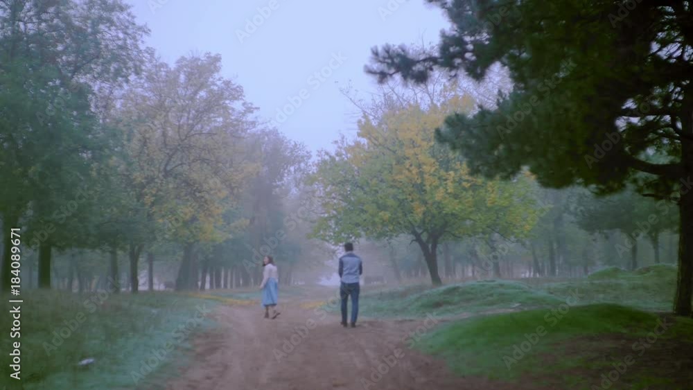 romantic scene of couples foggy day on the road romantic scene of couples foggy day on the road