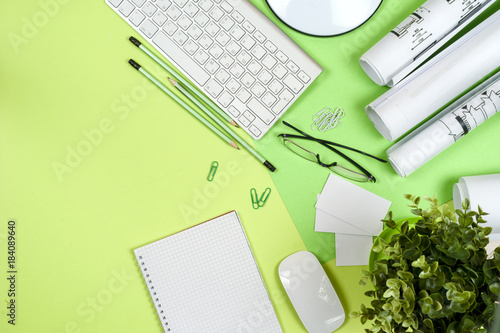 Workplace of architect - rolls and plans.