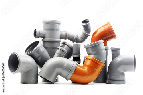 Composition from plastic sewer pipes, isolated on the white