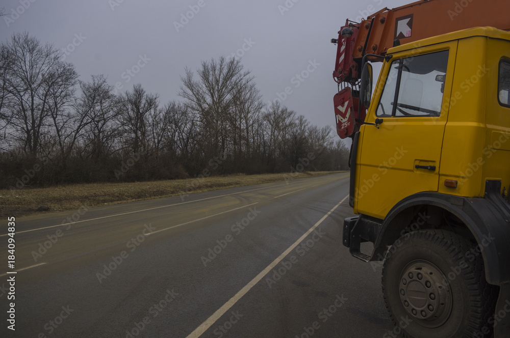 truck crane on highway roadside