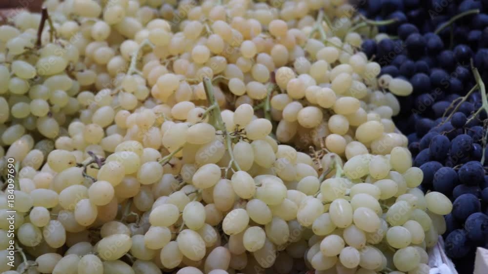 grapes on sale on the shelf in the market - oriental bazaar grapes on sale on the shelf in the market - oriental bazaar