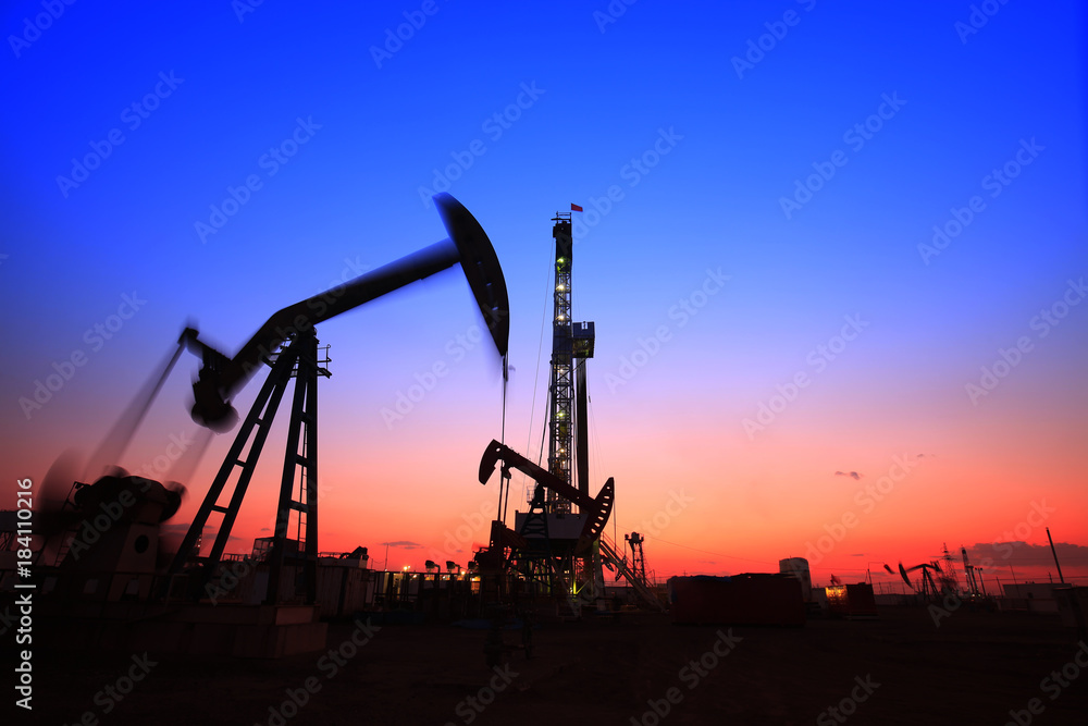 In the evening of oilfield derrick In the evening of oilfield derrick