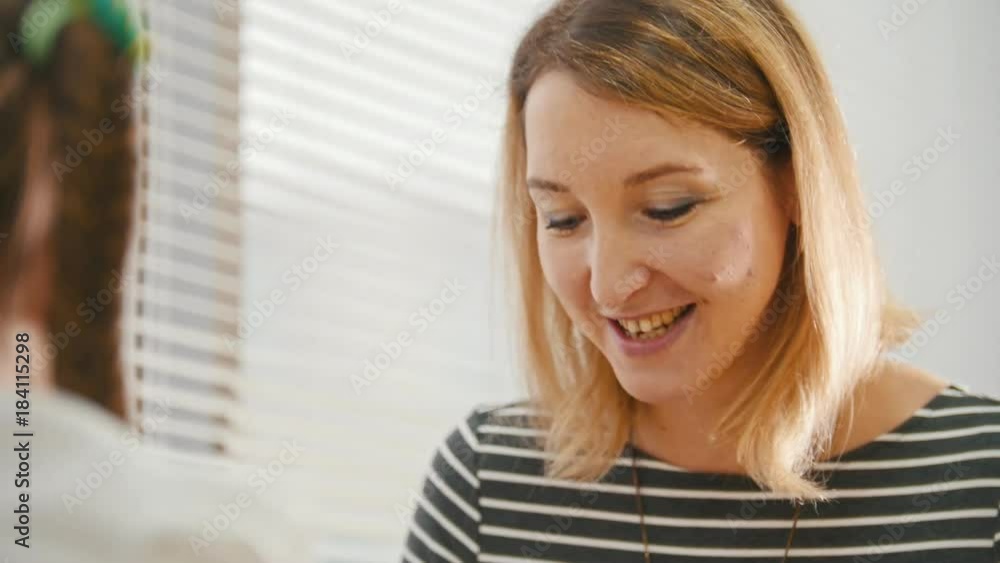 Young woman talking and smiling, portrait Young woman talking and smiling, portrait