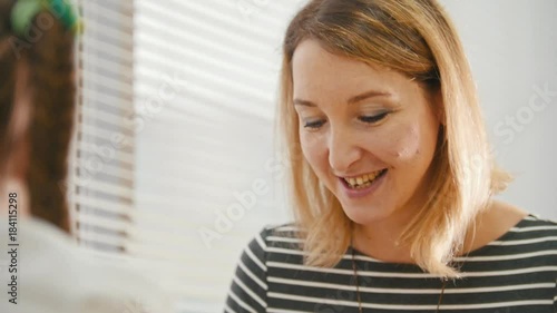 Young woman talking and smiling, portrait photo