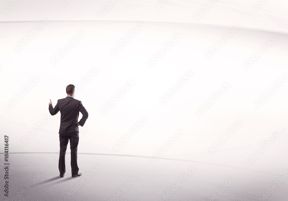 Businessman with briefcase standing still Businessman with briefcase standing still