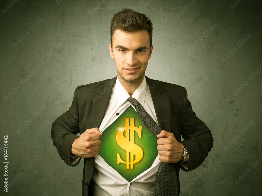 Businessman tearing off his shirt with dollar sign on chest Businessman tearing off his shirt with dollar sign on chest