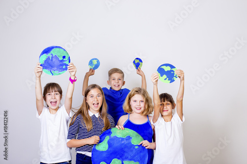 Kids with a globe