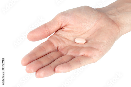 pills in woman hand