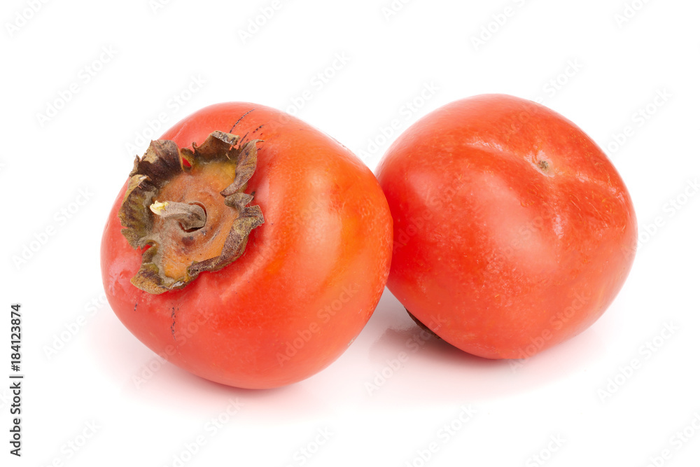 Persimmon fruit isolated on white background close-up Persimmon fruit isolated on white background close-up