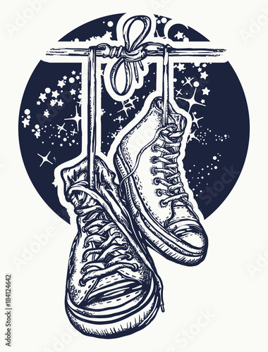 Boots hanging from electrical wire tattoo and t-shirt design. Symbol of freedom, street culture, graffiti, street art. Sneakers on wires in space