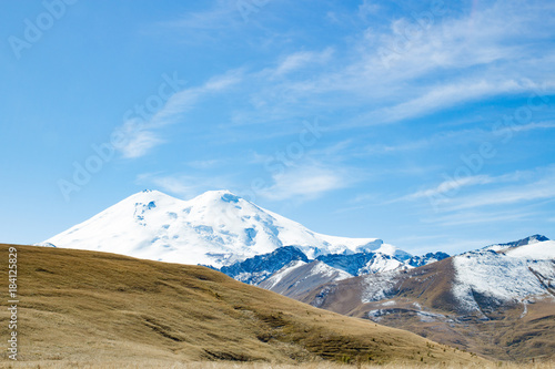 Landscape panorama Elbrus mountain with autumn hills © nellino7