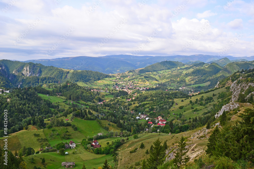 View of the Carpathians with village, Romania