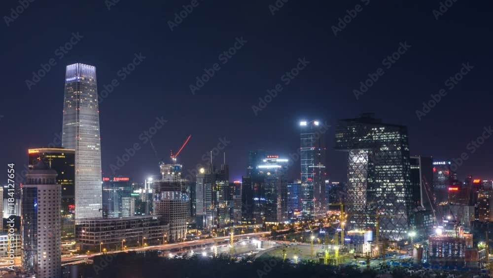 Timelapse. CBD Skyscrapers at Night with Tower Crane in Construction Field,Beijing,China. Timelapse. CBD Skyscrapers at Night with Tower Crane in Construction Field,Beijing,China.