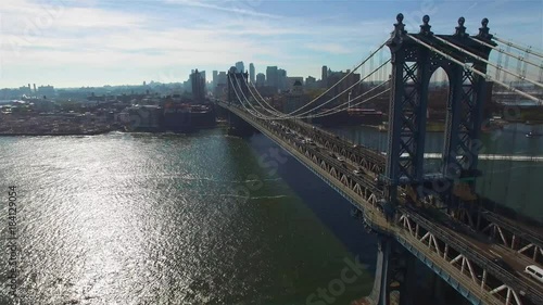 4K Aerial view of Manhattan Bridge in autumn, camera crossing the bridge to the left, Brooklyn side seen. Concept of connection.