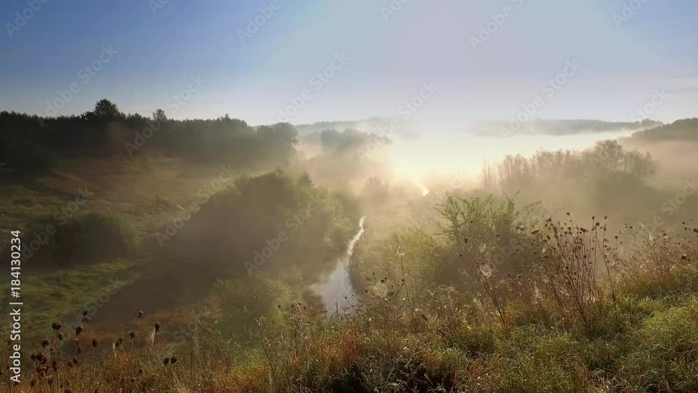 Beautiful sunrise over valley with beautiful mist in autumn, Poland, Europe Beautiful sunrise over valley with beautiful mist in autumn, Poland, Europe