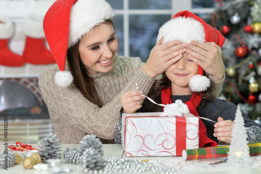 Mother and daughter celebrating Christmas