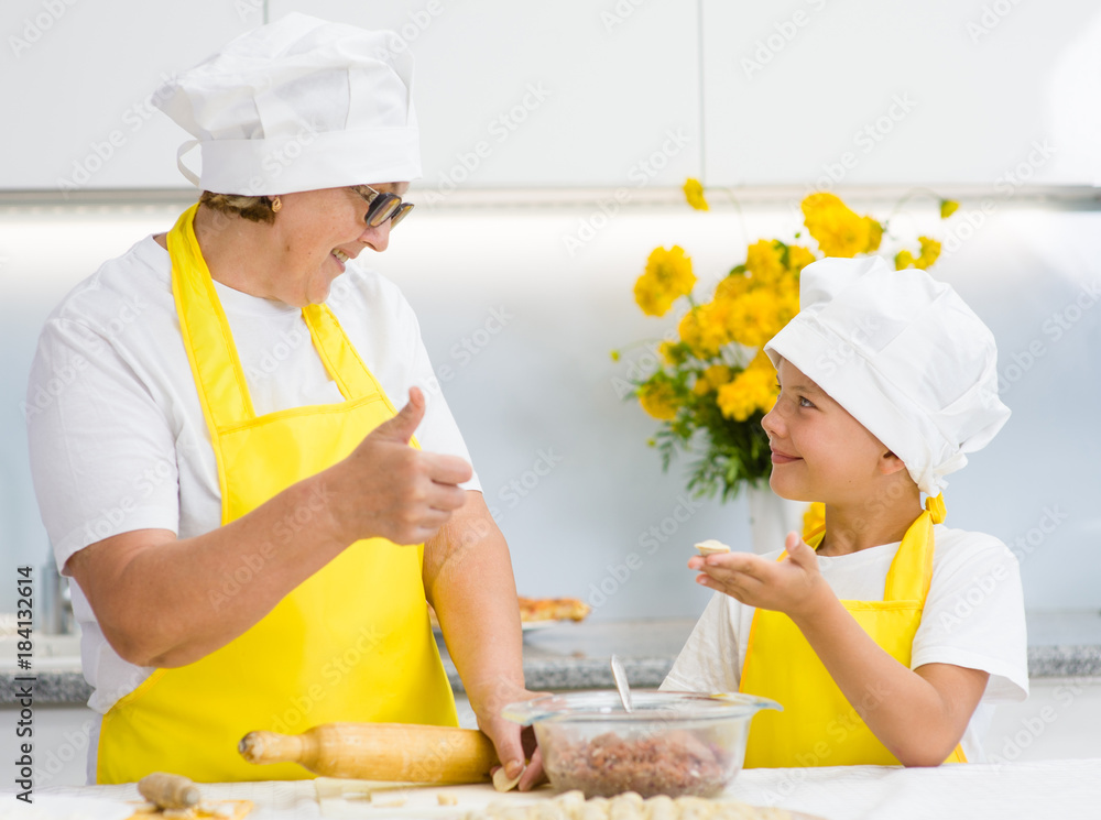 grandmother praises his grandson for successfully molded dumplings grandmother praises his grandson for successfully molded dumplings