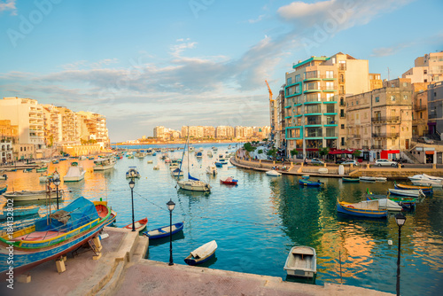 beautiful view of harbor with maltese yachts and boats in St. Julians to Sliema, Spinola Bay, Malta © Alisa
