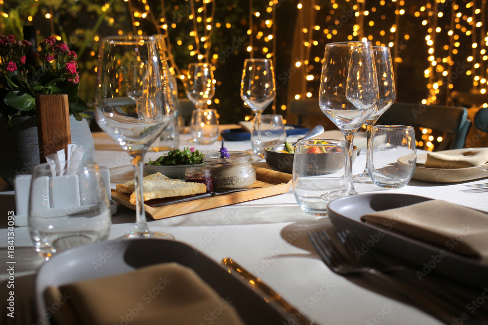 service with silverware and glass stemware for an event party