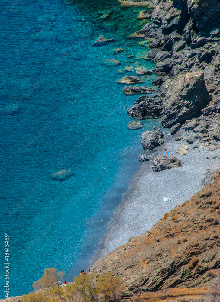 Secluded nudist beach in Astypalaia island in Greece