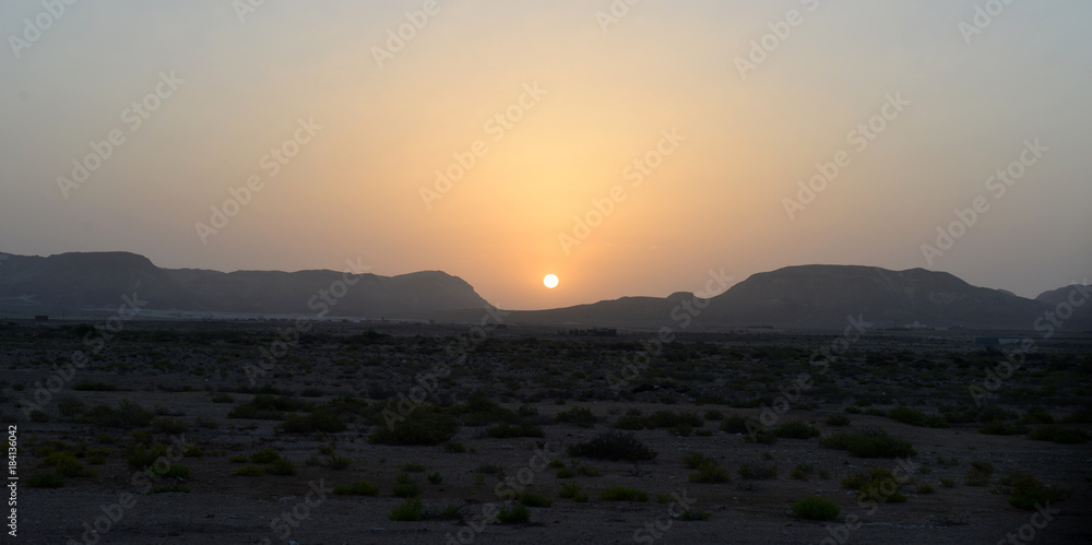 Sunset in the desert of Oman