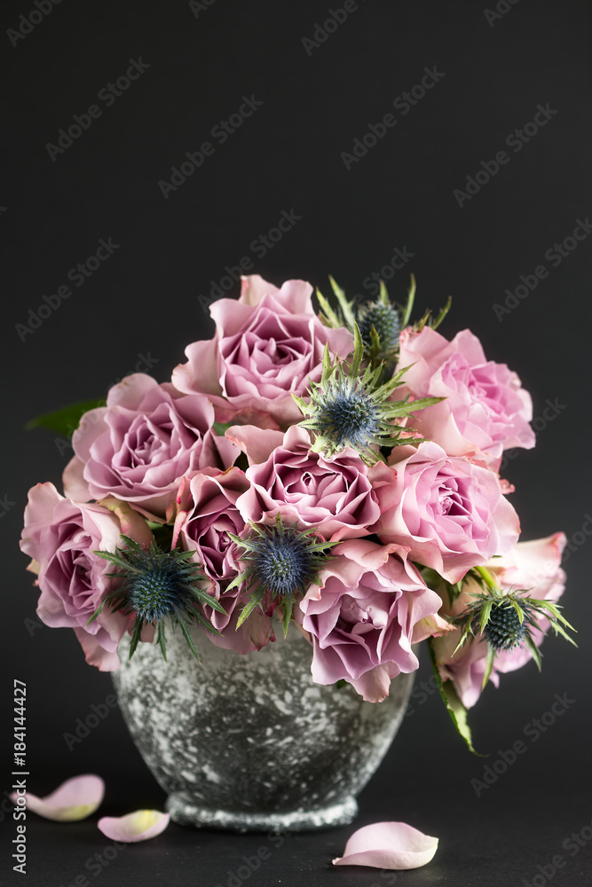 Pink roses in a vase.