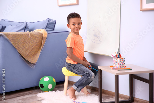 Little African-American boy...