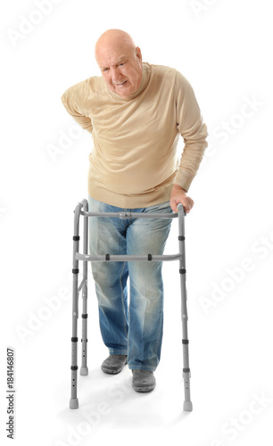 Elderly man with walking fr...