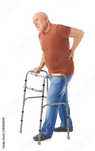 Elderly man with walking fr...