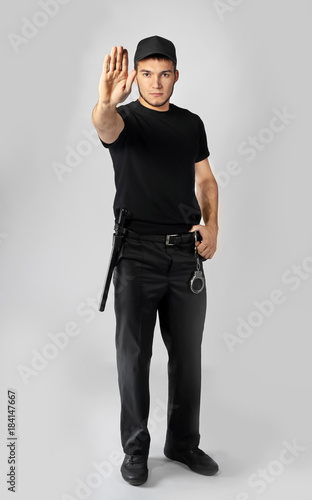 Male security guard on ligh...