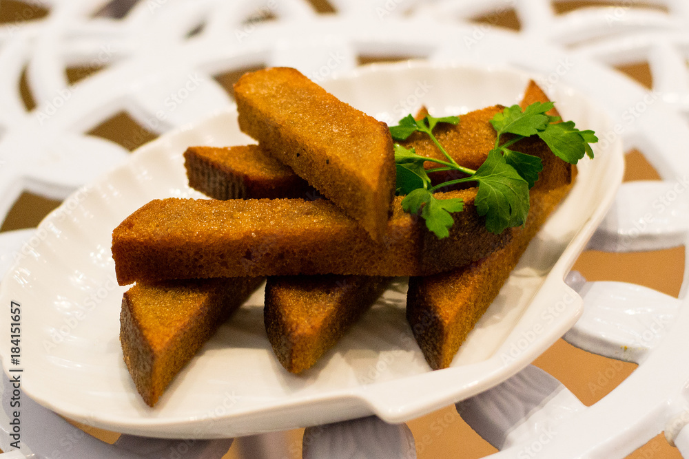 Snack of croutons from black bread with greens Snack of croutons from black bread with greens