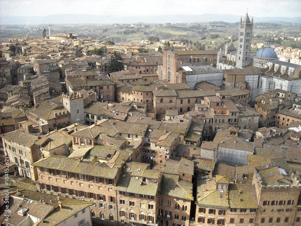 Scenery of Siena, a beautiful medieval town in Tuscany, with view of the Dome & Bell Tower of Siena Cathedral (Duomo di Siena)