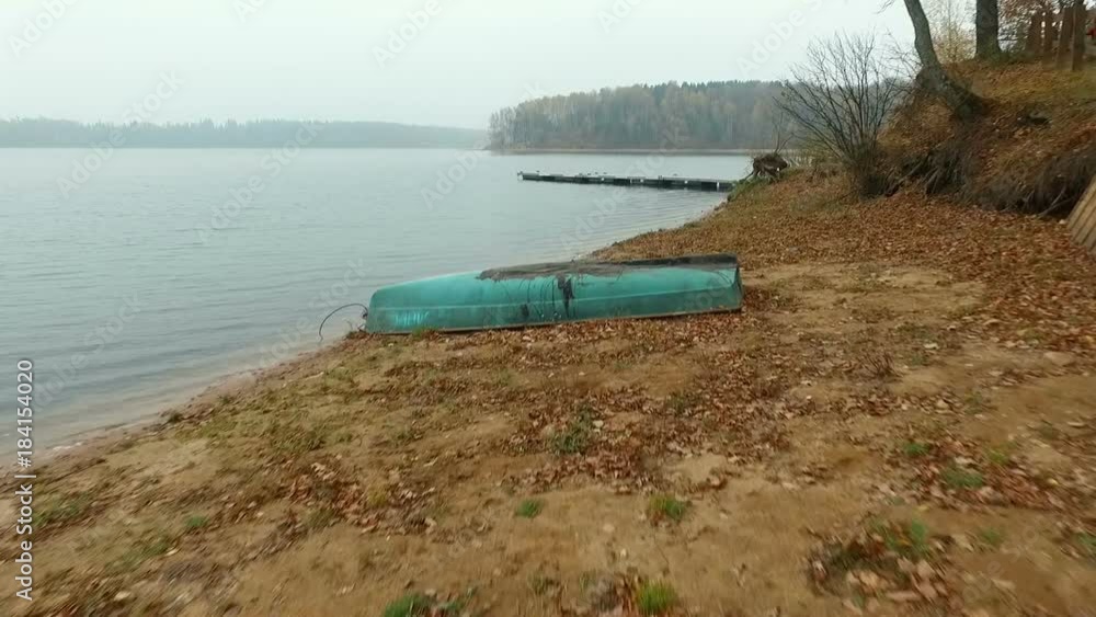 Boat on the Lake in autumn forest Boat on the Lake in autumn forest