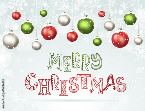 Happy holidays greeting card. Colorful and bright Merry Christmas balls with snowflakes on blue background.  Modern calligraphy with Christmas balls horisontal composition.