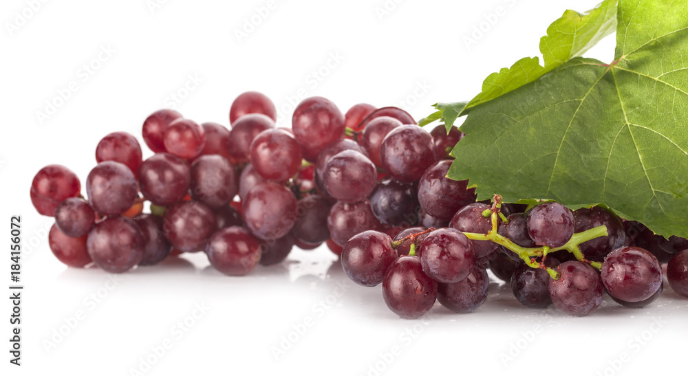 Red grape with leaf isolated on white background Red grape with leaf isolated on white background
