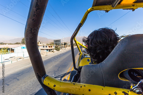 Nazca, Peru - August 13, 2017: Tourist Buggy doing a tour in Nazca, Peru photo