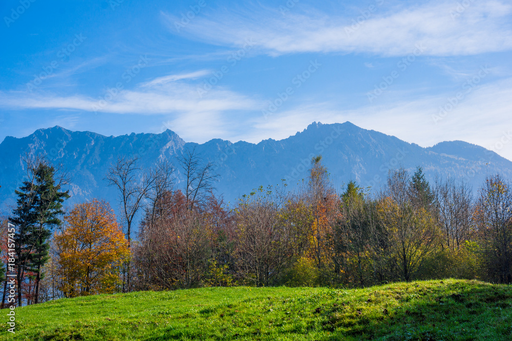 landscape in the Alps with fresh green meadows. Swiss Alps