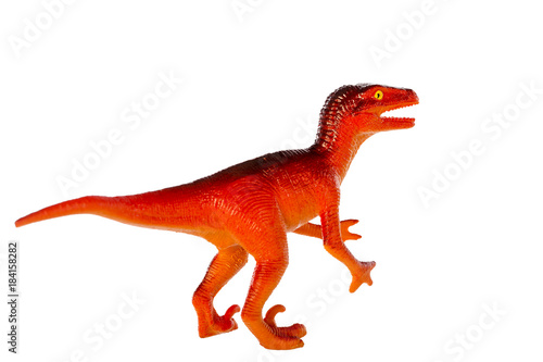 Raptor dinosaurs toy isolated on white background ,with clipping path © suwatwongkham