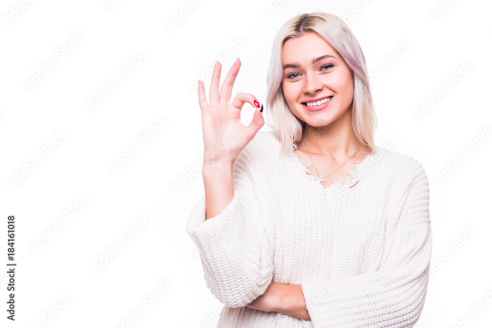 O.K. Happy smiling beautiful young woman showing okay gesture, isolated white background. Positive human emotion O.K. Happy smiling beautiful young woman showing okay gesture, isolated white background. Positive human emotion